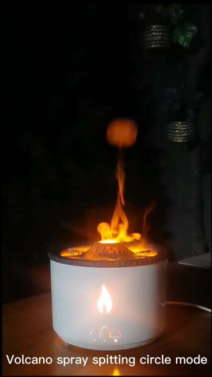 Volcano-shaped humidifier emitting illuminated mist in a dark room, simulating eruption effect