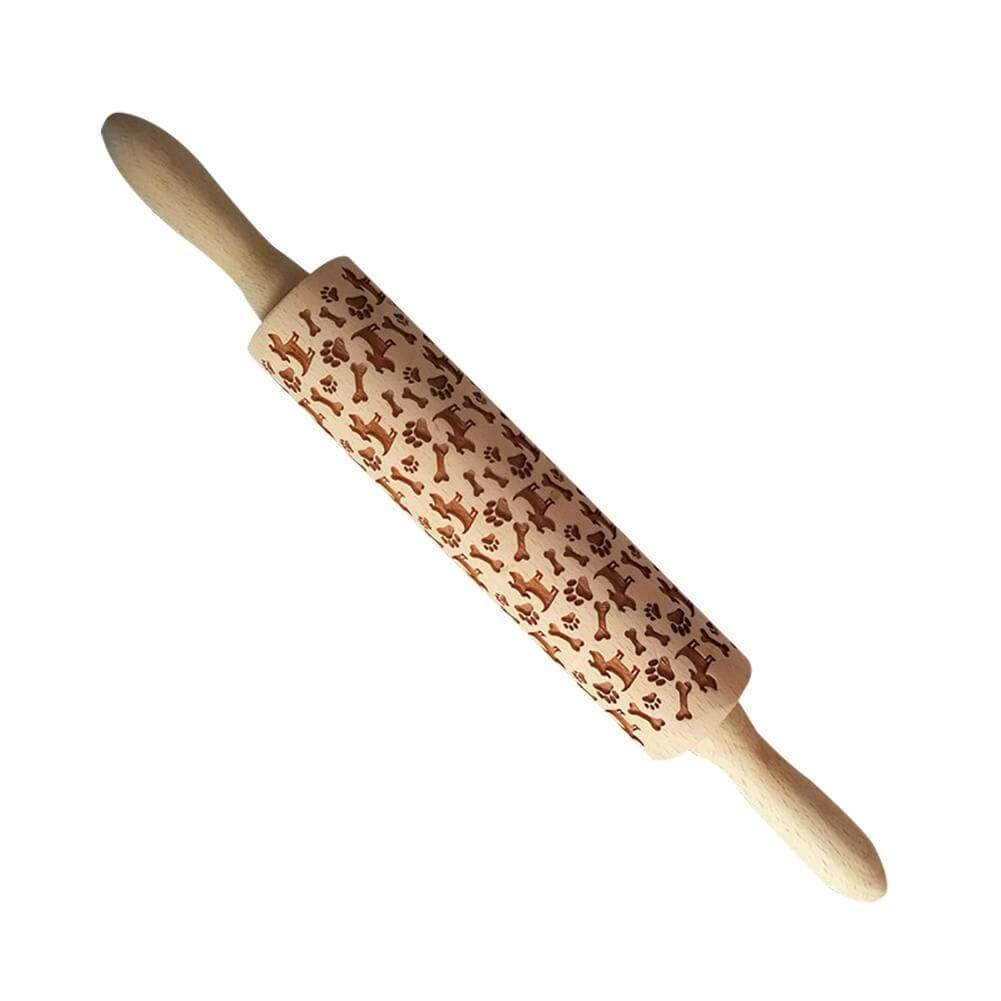 Wooden embossing rolling pin with dog, bone, and paw print pattern for baking.