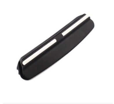 Magnetic knife holder for kitchen storage, black with silver strip, on white background