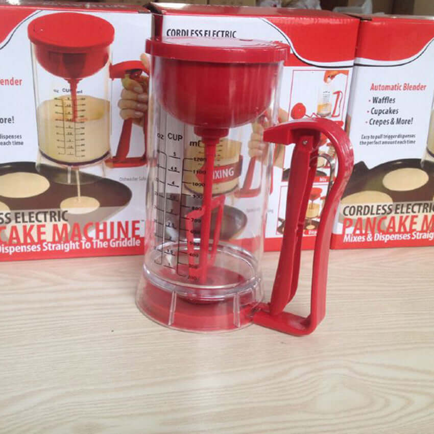 Cordless electric pancake batter dispenser with red lid and handle for easy batter pouring