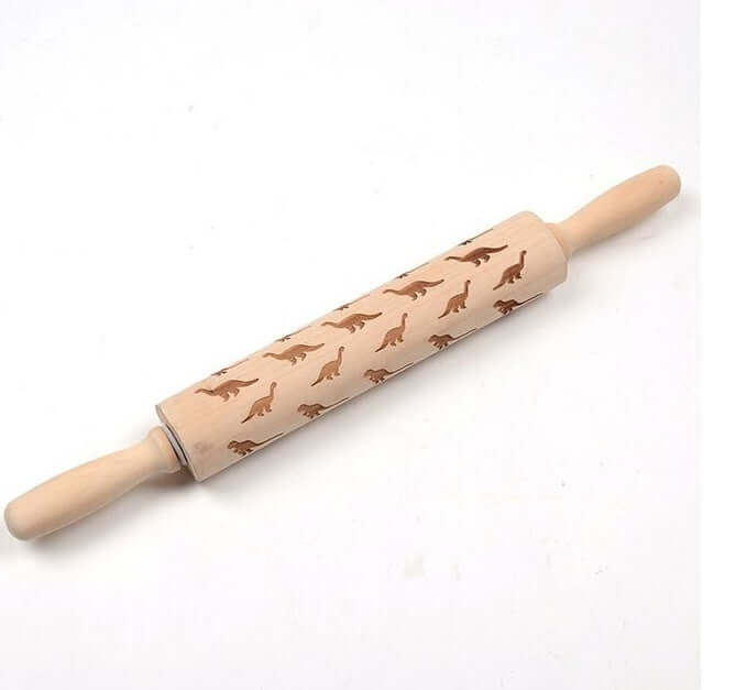 Wooden rolling pin with dinosaur pattern for baking and kitchen decorating