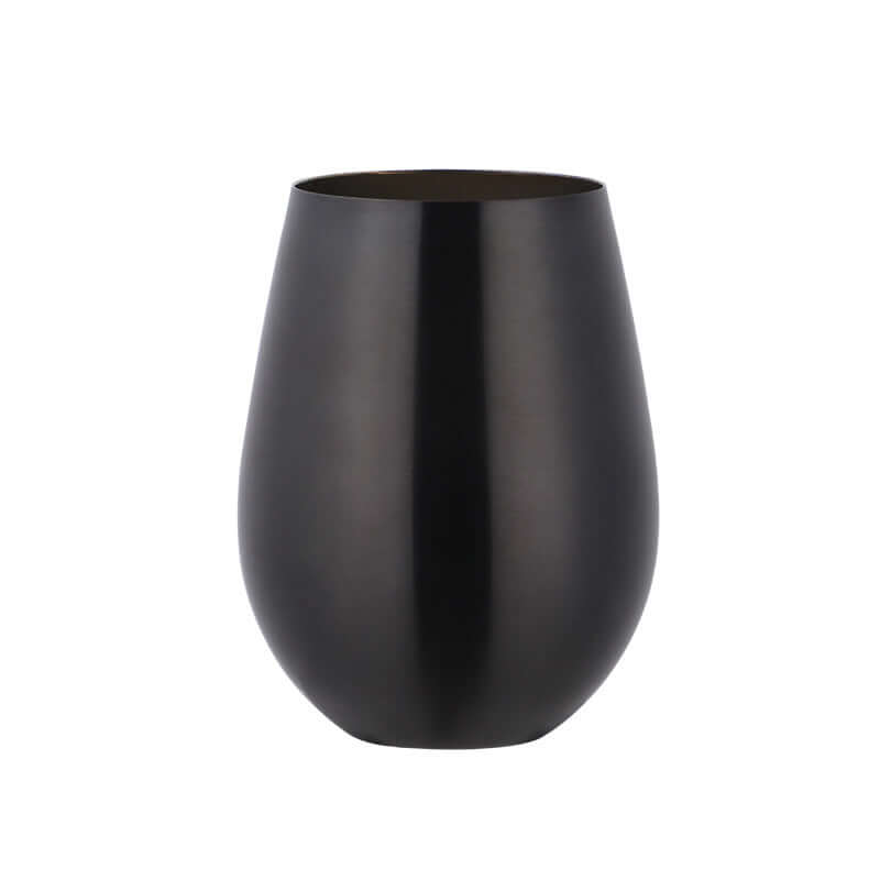 Matte black stainless steel stemless wine glass on white background