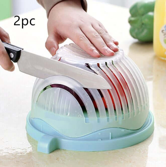 Hand using kitchen salad cutter bowl to slice vegetables easily