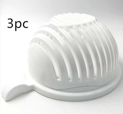 White salad cutter bowl with slotted lid, kitchen tool, 3-piece set on white background