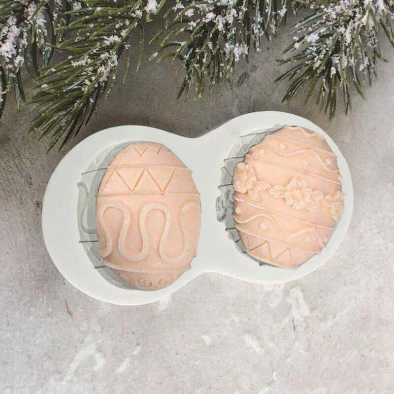 Decorative silicone mold with two Easter egg designs for baking or chocolate crafting