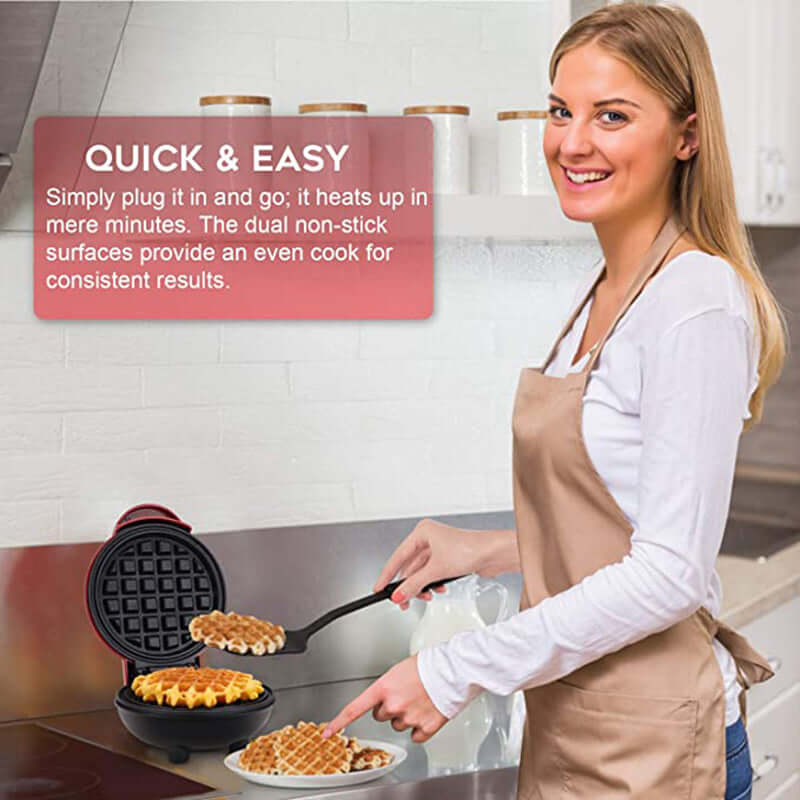 Woman using non-stick waffle maker in modern kitchen, serving fresh waffles onto plate
