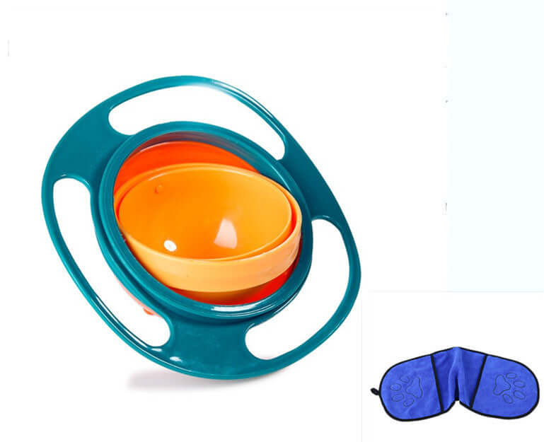 Gyro spill-proof baby bowl in teal and orange with a blue sleep mask on white background