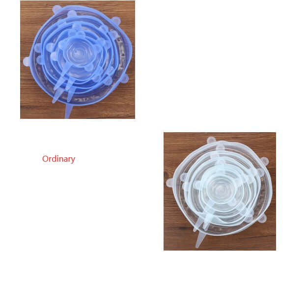 Two sets of silicone stretch lids in blue and clear, stacked on wooden surface for kitchen storage.