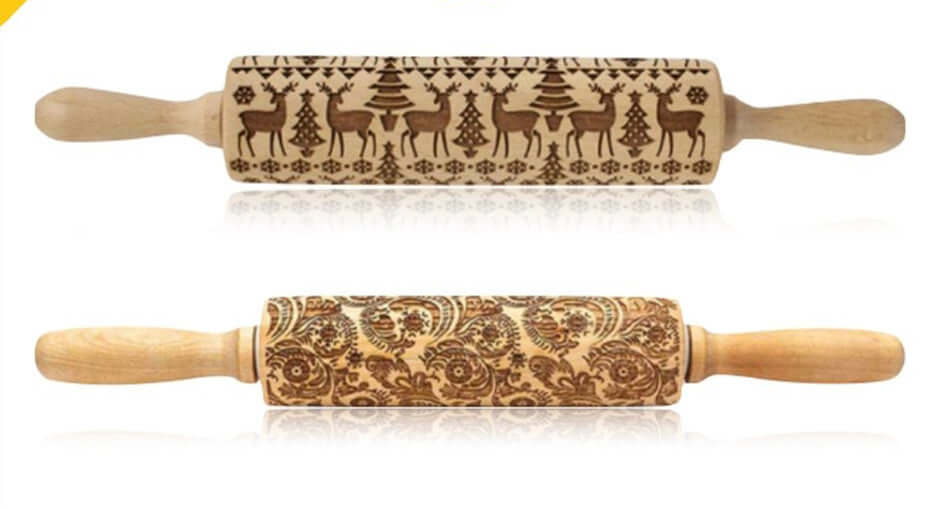 Two wooden embossed rolling pins with festive and floral patterns for baking cookies