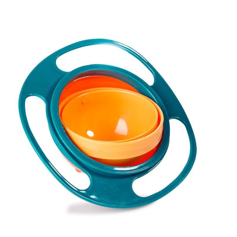 Gyro bowl for kids, orange inner bowl with blue spill-proof rotating outer ring on white background