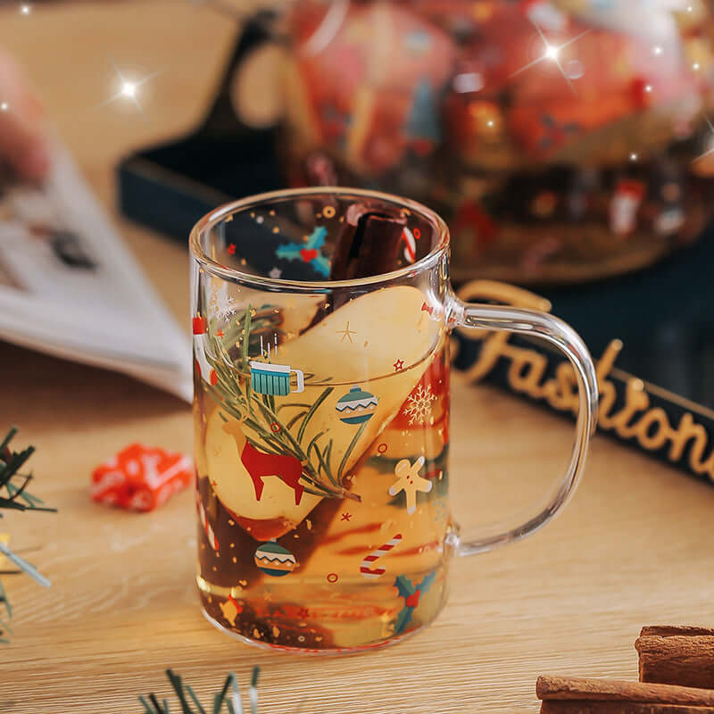 Glass mug of spiced tea with apple slices, cinnamon, holiday designs, on wooden table