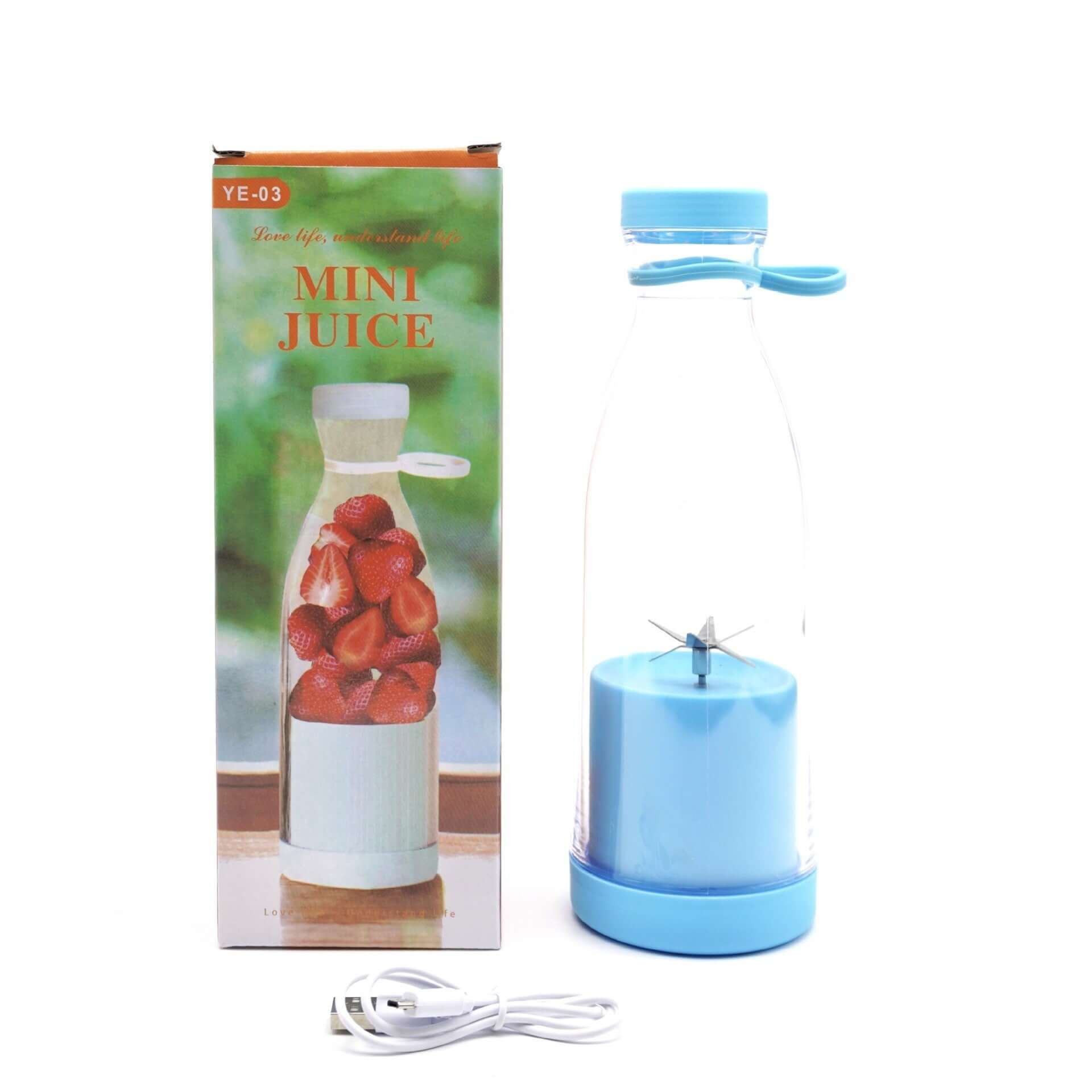 Portable mini blender with blue base, USB cable, and product box featuring strawberries.