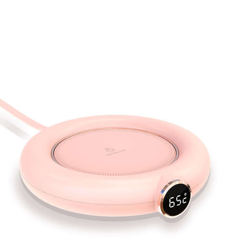 Pink electric mug warmer with digital temperature display, modern kitchen accessory