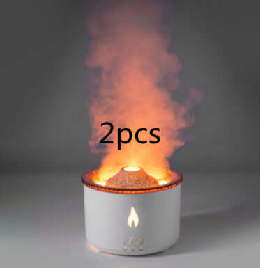 Aromatic essential oil diffuser with orange mist and flame effect, labeled 2pcs.