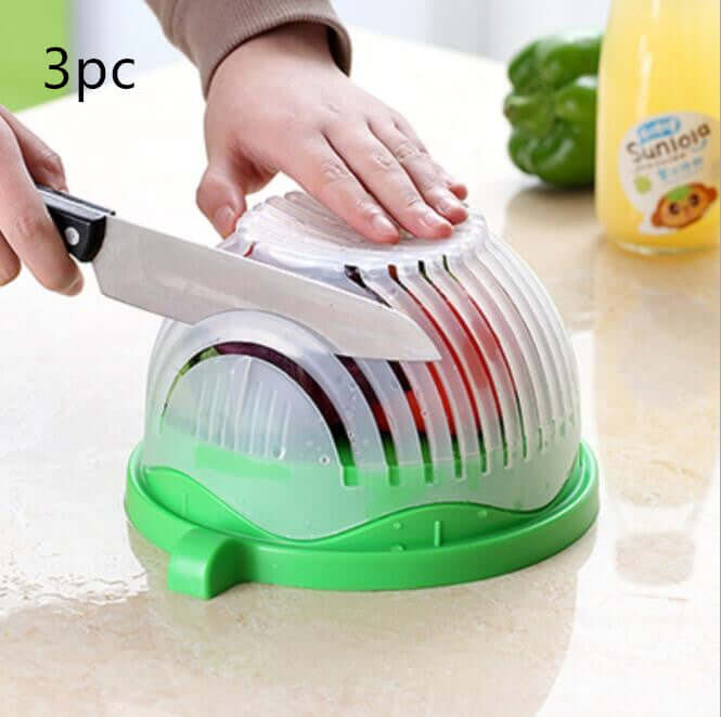 Salad cutter bowl kitchen accessory with knife slicing vegetables on countertop