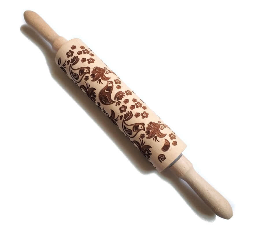 Wooden embossed rolling pin with decorative floral and bird pattern for baking