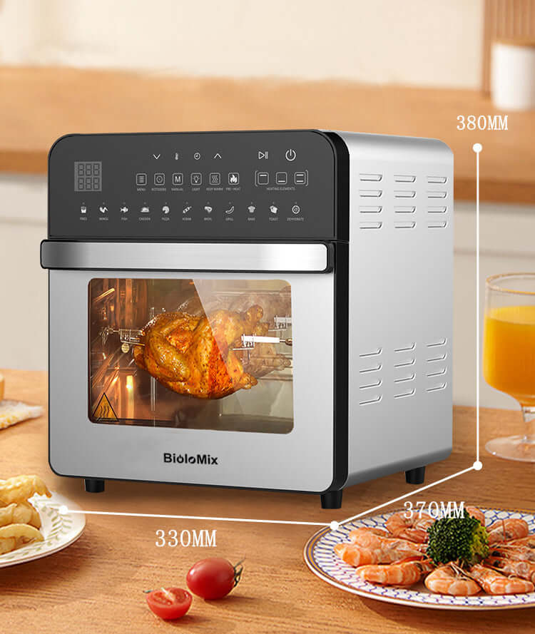 Countertop stainless steel air fryer oven cooking rotisserie chicken, with kitchen food and dimensions.