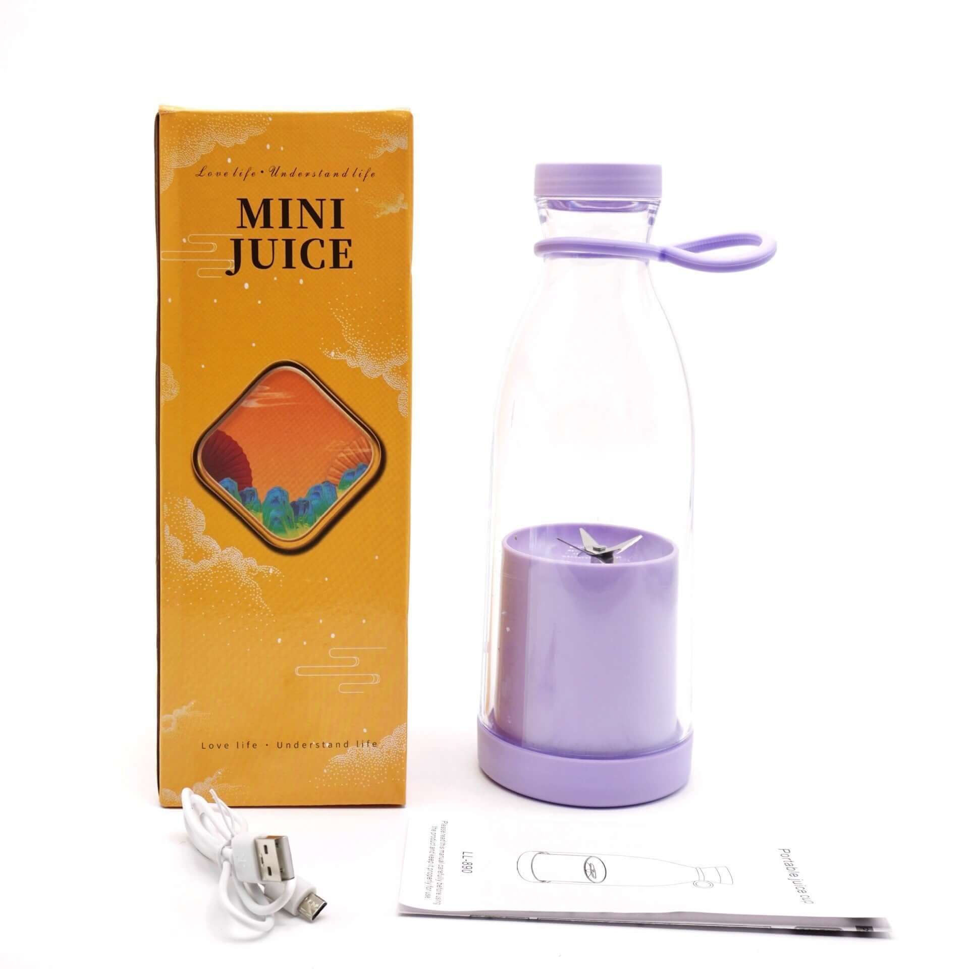 Portable mini juice blender with lavender base, box, USB cable, and manual on white background