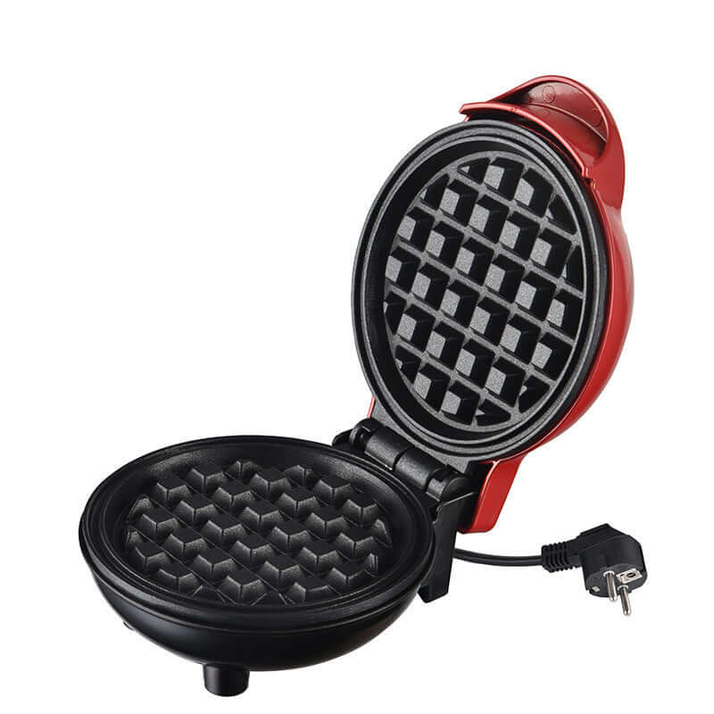 Red electric waffle maker with non-stick plates, open and ready for use on kitchen counter