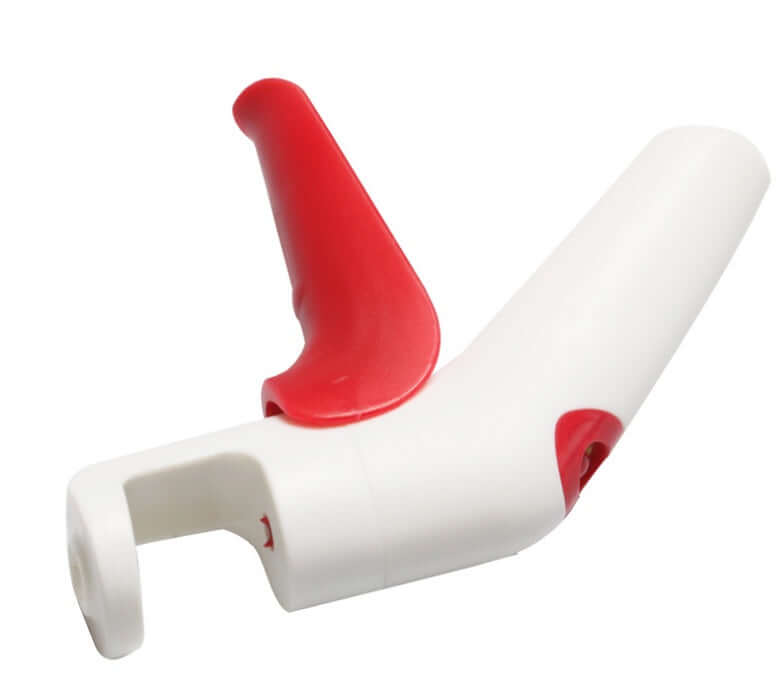 White and red jar opener kitchen tool with ergonomic handle on white background