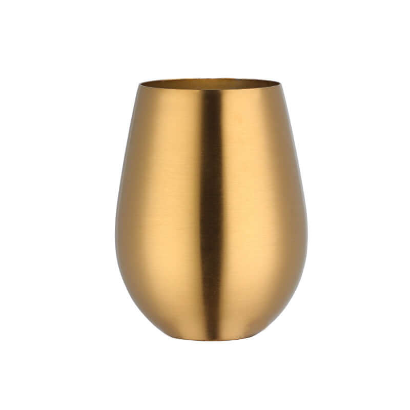 Gold stainless steel stemless wine glass on white background, modern kitchen accessory