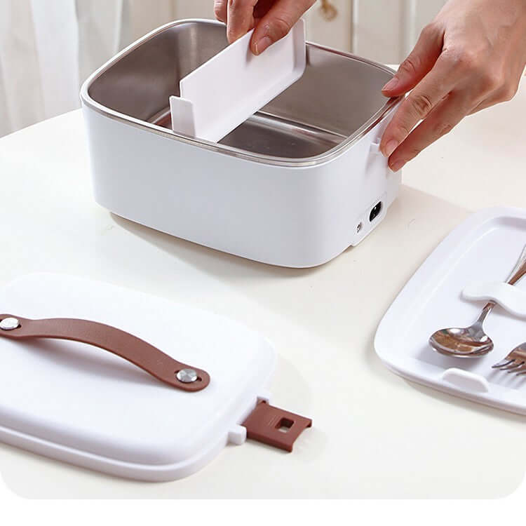 Electric lunch box with stainless steel interior, removable divider, and utensil tray