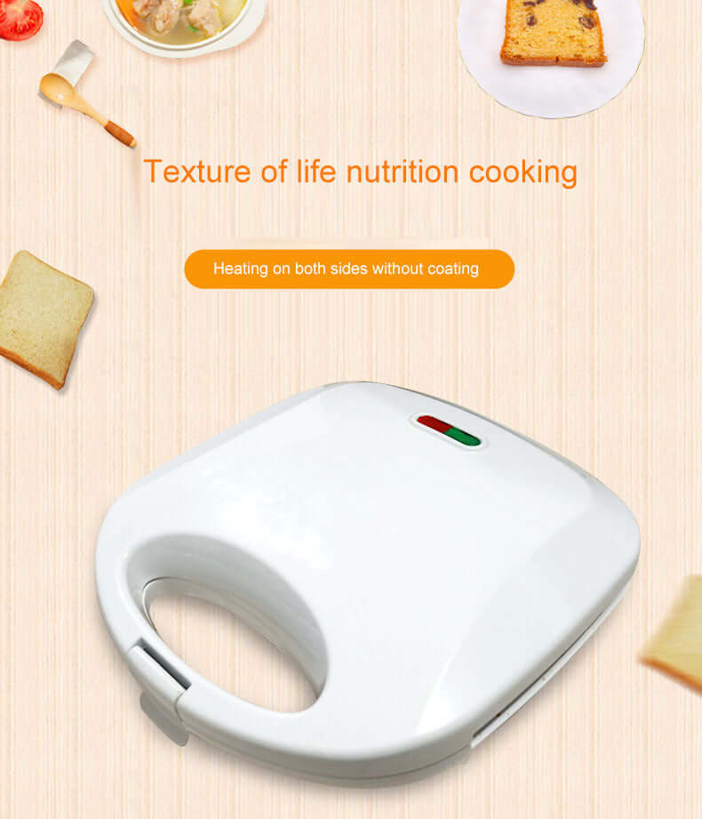 White sandwich maker kitchen appliance on light countertop with bread slices and food items