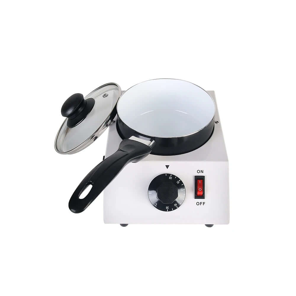 Electric cooker with timer dial, glass lid, and black handle kitchen appliance