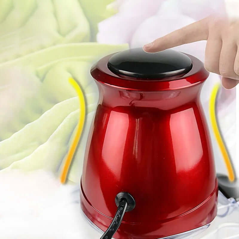Red electric kitchen appliance with push button, hand pressing top, countertop background
