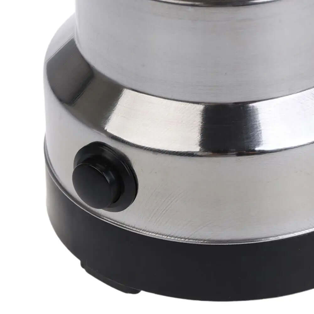 Close-up of stainless steel electric kitchen appliance base with black power button