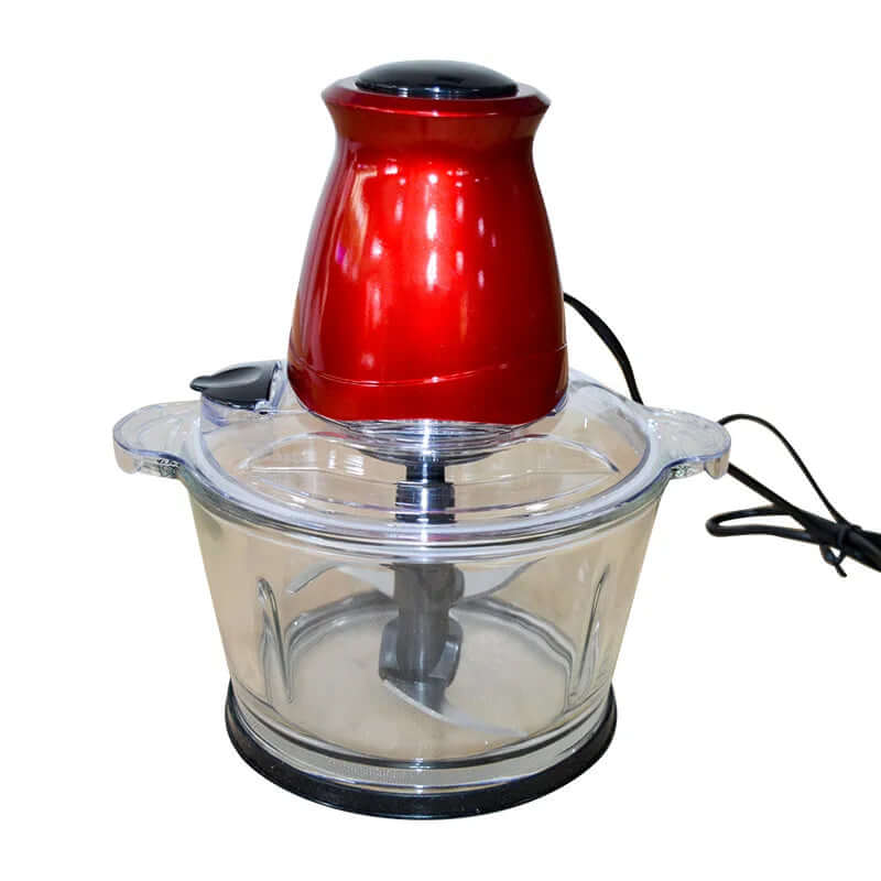 Electric food chopper with red motor and clear glass bowl, kitchen appliance on white background.