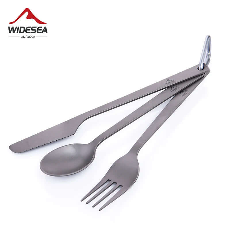 Titanium camping cutlery set with knife, spoon, fork and carabiner on white background