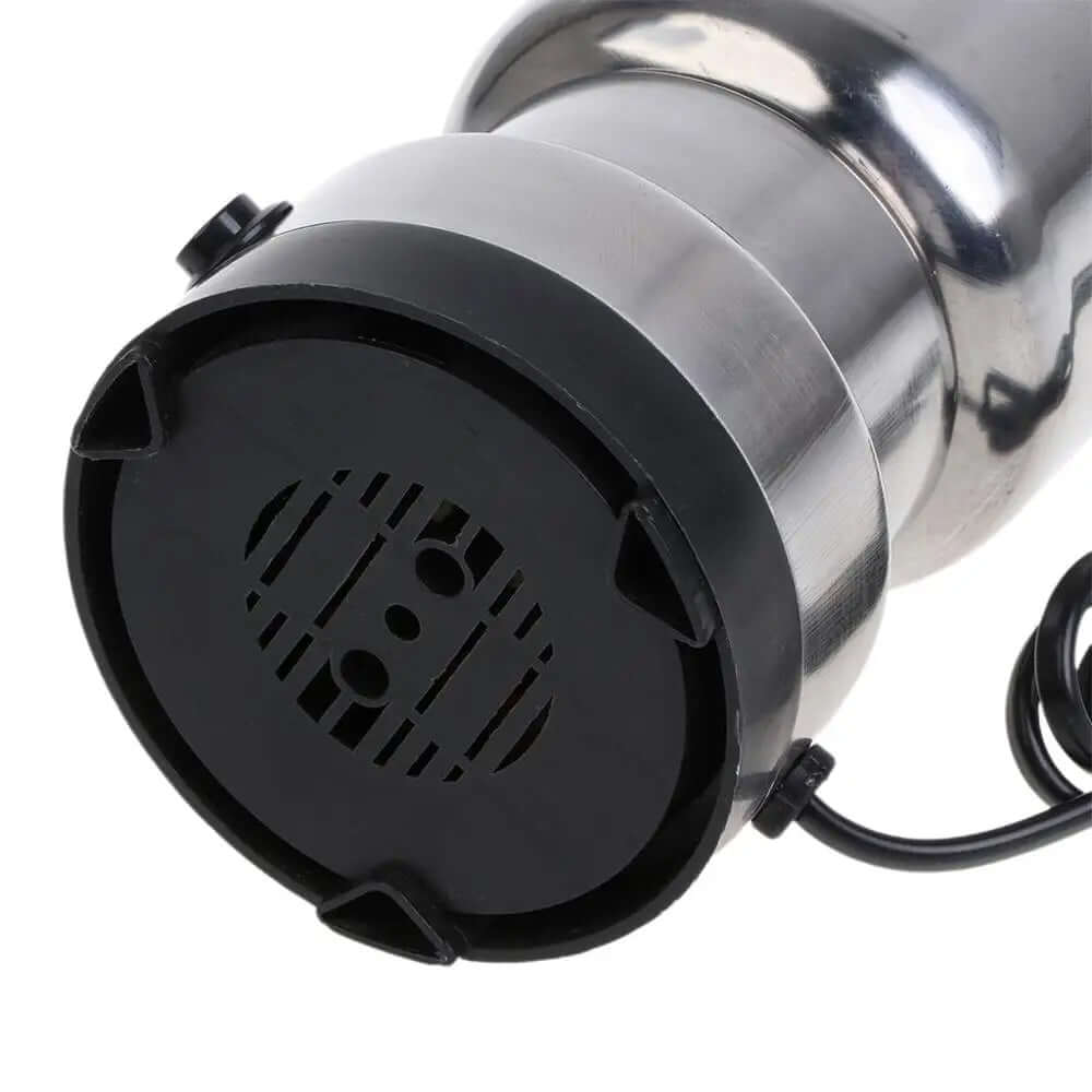 Close-up of stainless steel electric kitchen appliance base with power cord