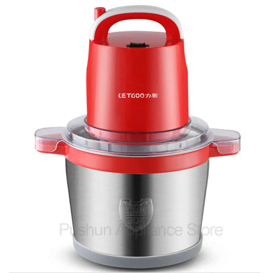Electric food chopper with red motor unit, stainless steel bowl, and clear plastic lid
