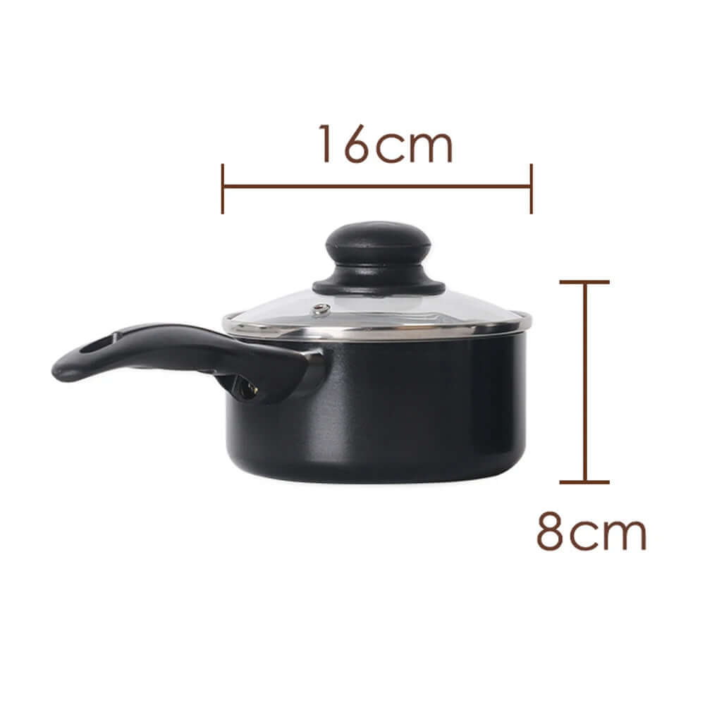 Small black saucepan with glass lid, 16cm wide and 8cm tall, kitchen cookware.