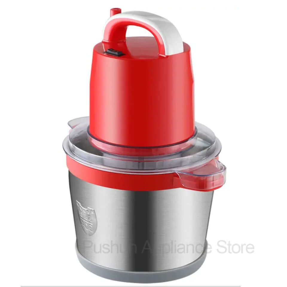 Electric food chopper with red lid, stainless steel bowl, and clear plastic cover