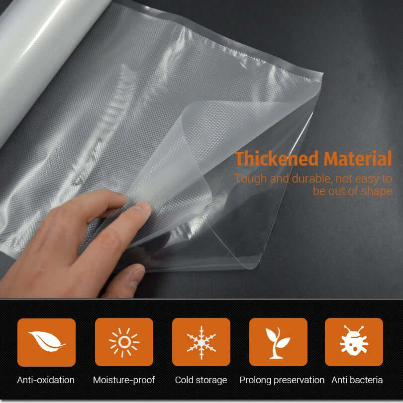 Hand holding thick vacuum sealer bag roll, moisture-proof, cold storage kitchen accessory