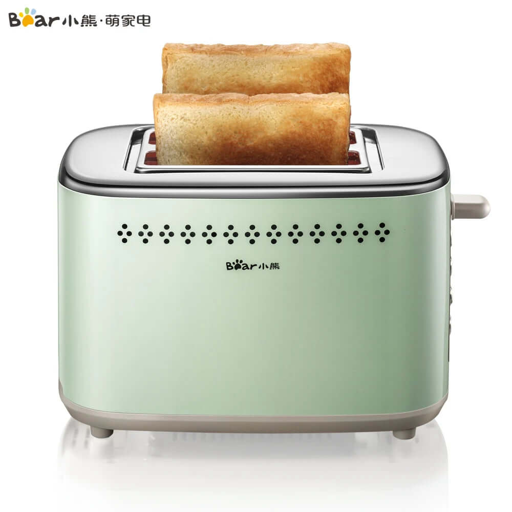 Mint green two-slice toaster with two toasted bread slices on white background