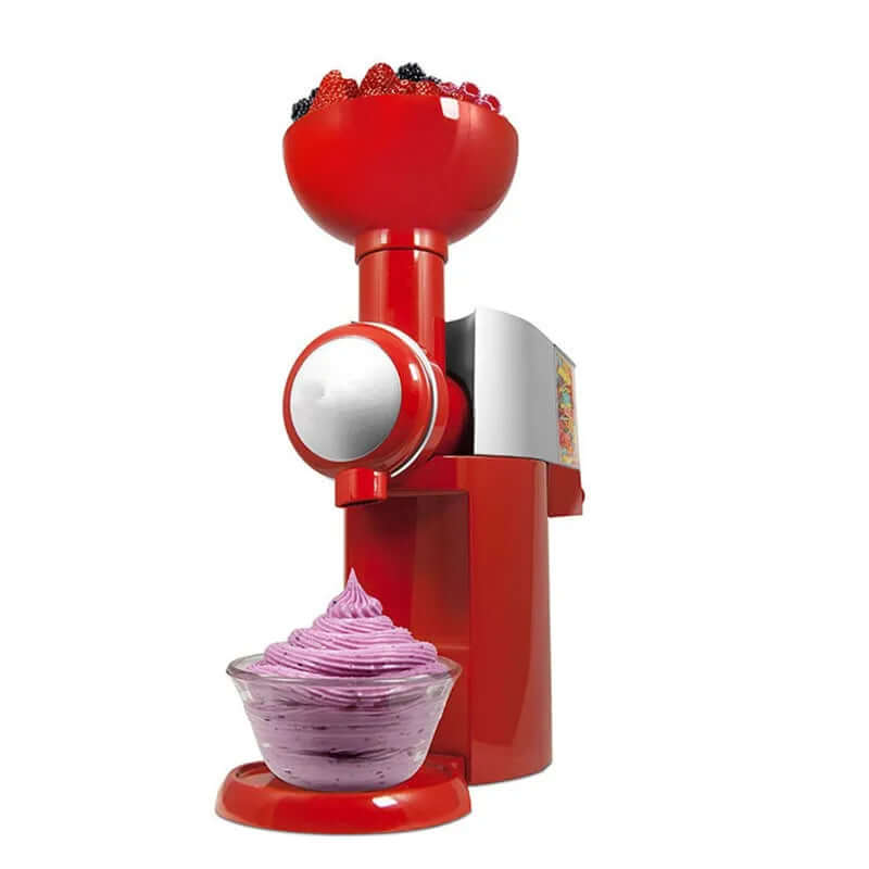 Red frozen dessert maker with fruit in top hopper and berry soft serve in glass bowl