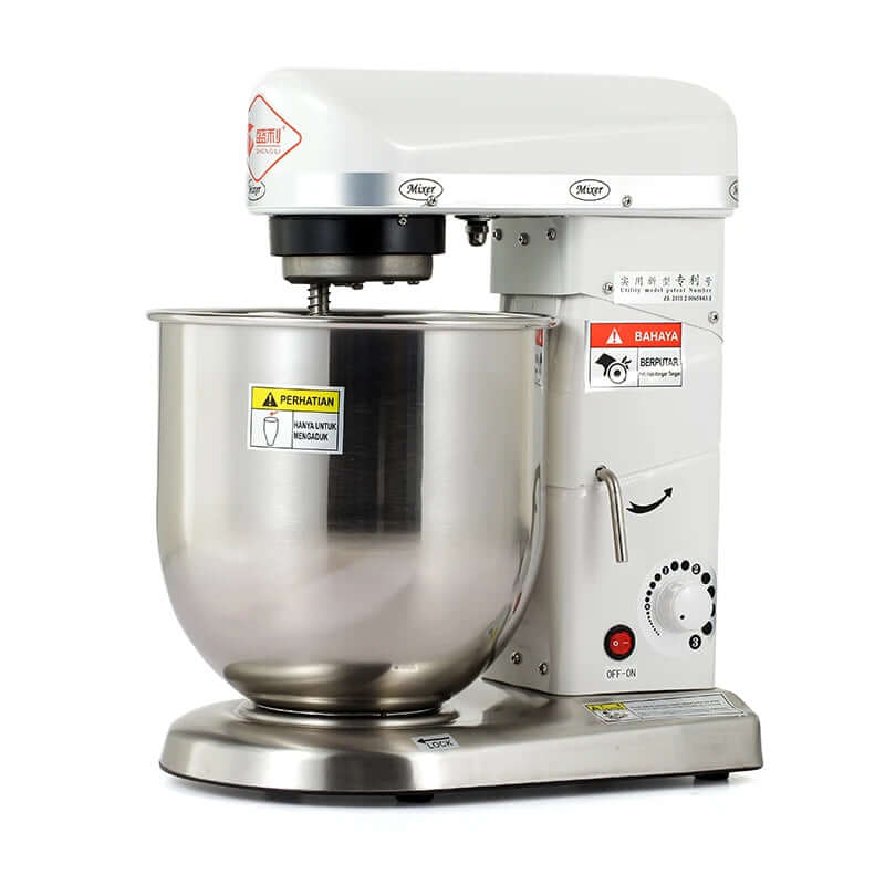 Electric stand mixer with stainless steel mixing bowl and control dial on white background