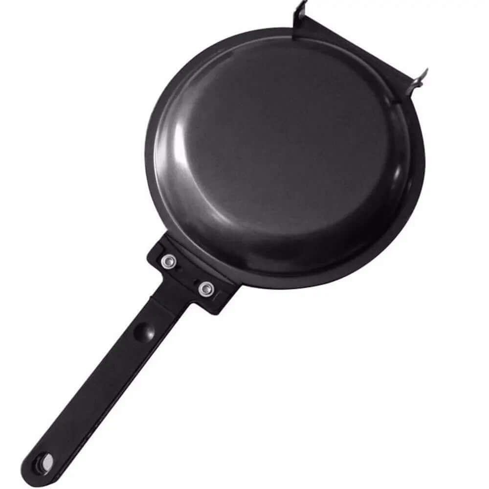 Nonstick black omelette frying pan with ergonomic handle on white background