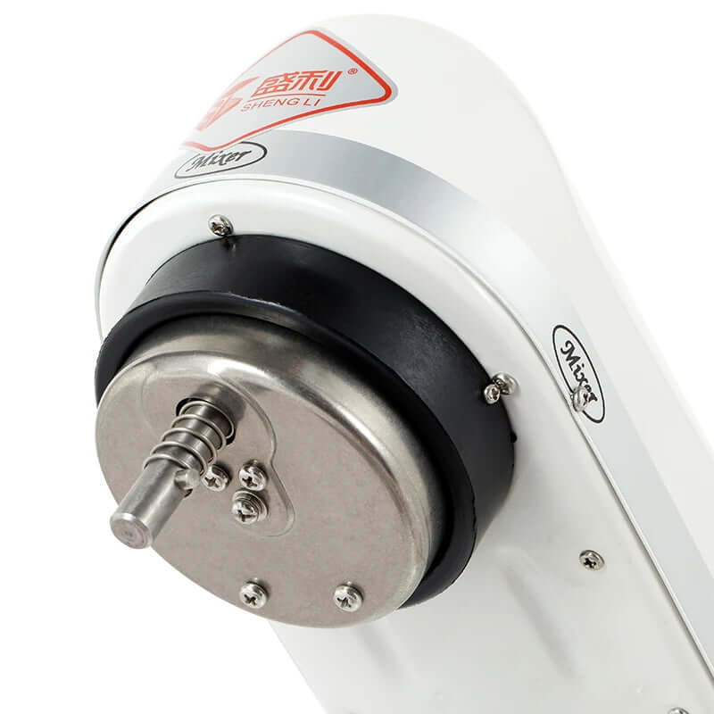 Close-up of electric stand mixer motor head and attachment hub in white and stainless steel