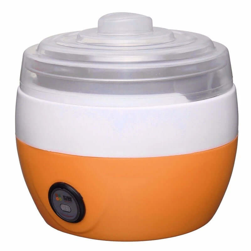 Electric orange and white kitchen appliance with a clear plastic lid, countertop food steamer