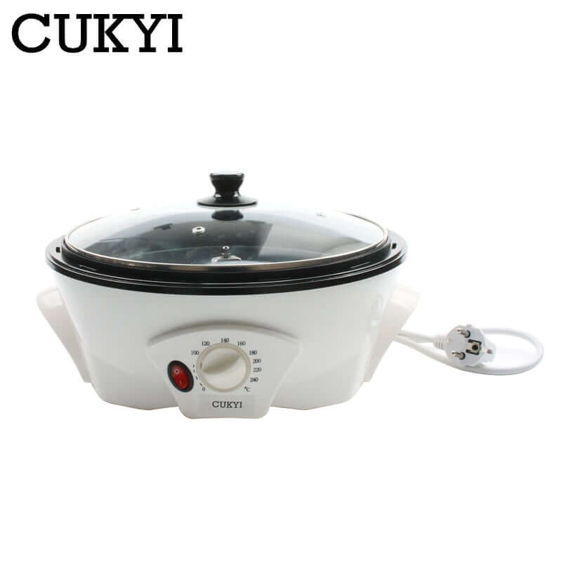 Electric multi-cooker with glass lid, temperature dial, and power cord, white kitchen appliance