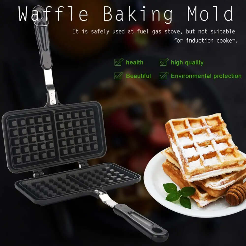 Nonstick waffle baking mold with handle, next to plate of cooked waffles and honey dipper