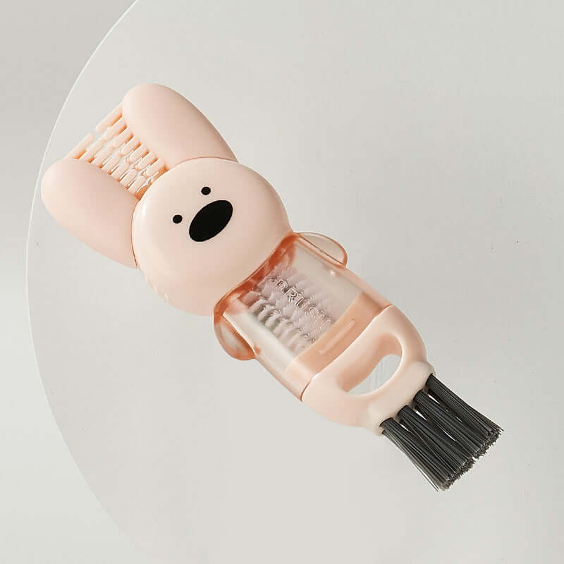 Cute pink bunny-shaped kitchen cleaning brush with bristles and a transparent handle