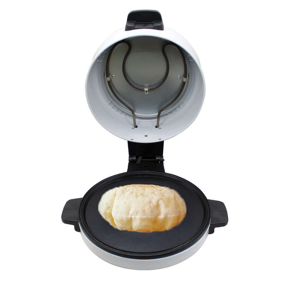 Electric pita bread maker baking flatbread on nonstick surface, open lid