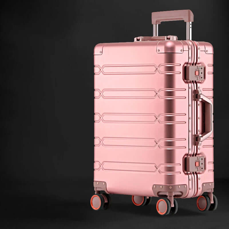 Pink hard shell suitcase with spinner wheels and combination locks on black background