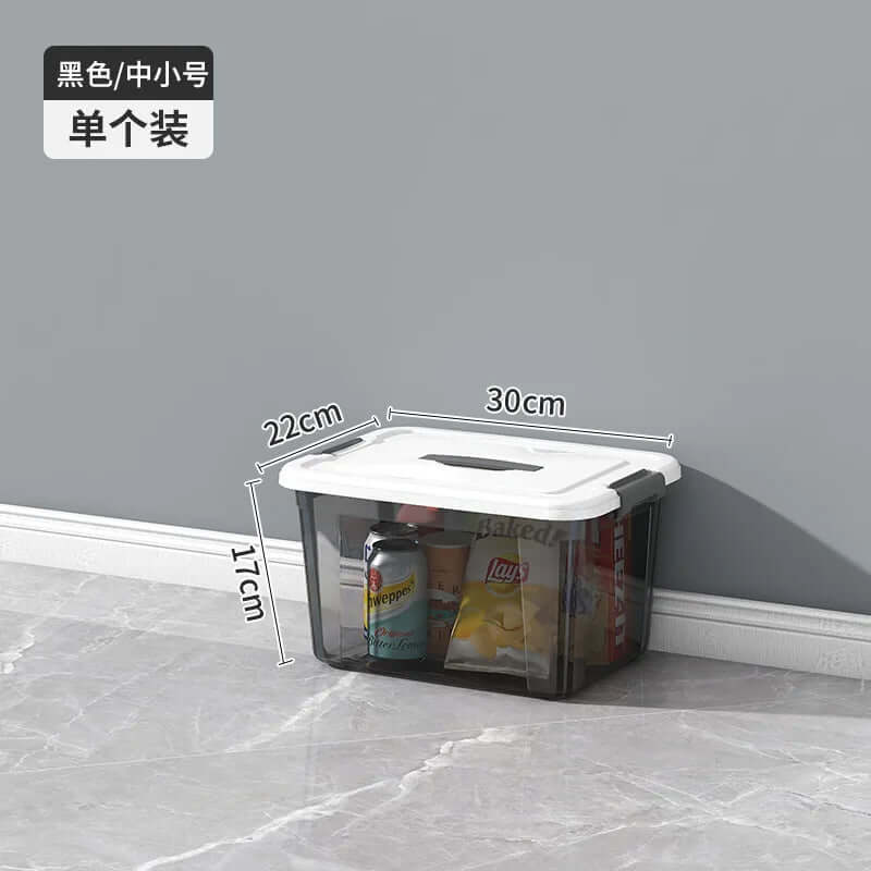 Clear plastic kitchen storage box with white lid, containing snacks, size 30x22x17 cm