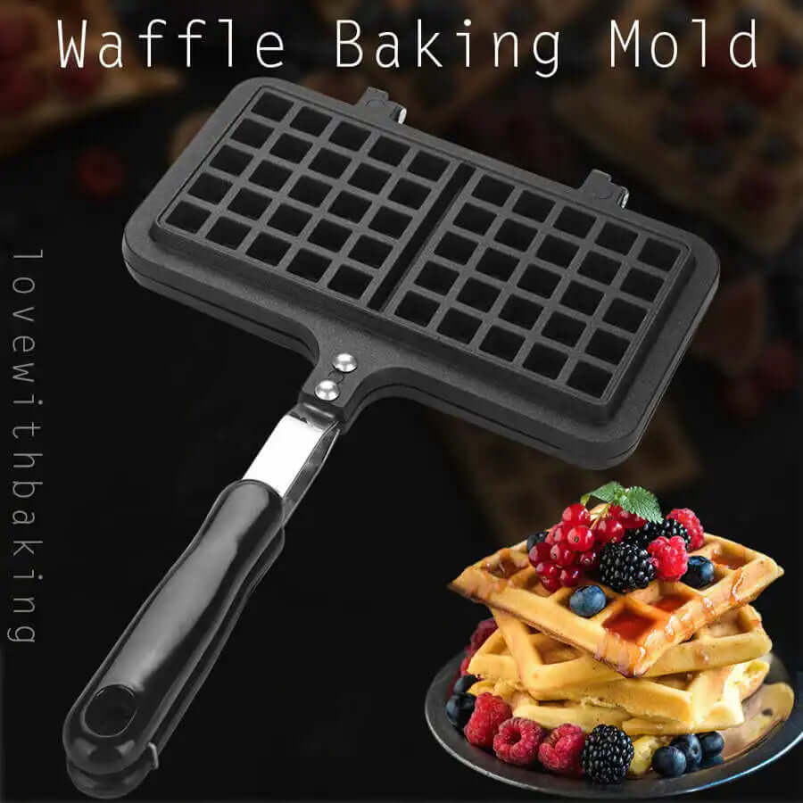 Non-stick waffle baking mold with handle, stacked waffles and fresh berries on plate